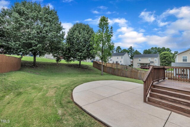 2714 Magnolia Tree Ln, Durham, NC 27703 - view of yard with a deck, a residential view, and a patio