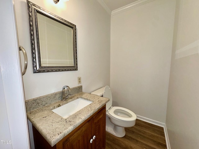 2535 Fairway Dr, Henderson, NC 27536 - half bath with ornamental molding, vanity, and wood finished floors
