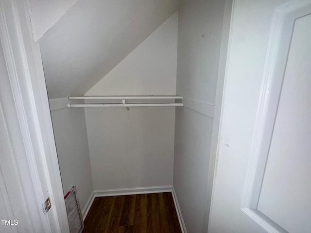 2535 Fairway Dr, Henderson, NC 27536 - walk in closet featuring vaulted ceiling and wood finished floors