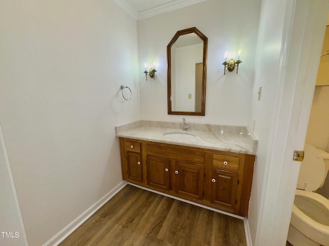 2535 Fairway Dr, Henderson, NC 27536 - bathroom with vanity, wood finished floors, and crown molding