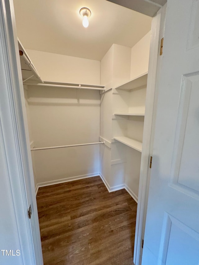 2535 Fairway Dr, Henderson, NC 27536 - spacious closet featuring dark wood-type flooring