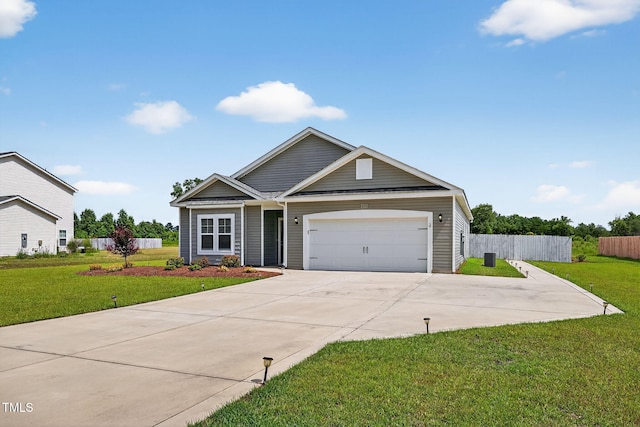 611 Laurel Lake Rd, Salemburg, NC 28385 - view of front of house featuring concrete driveway and an attached garage