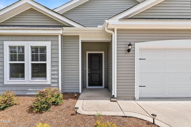611 Laurel Lake Rd, Salemburg, NC 28385 - view of exterior entry featuring a garage