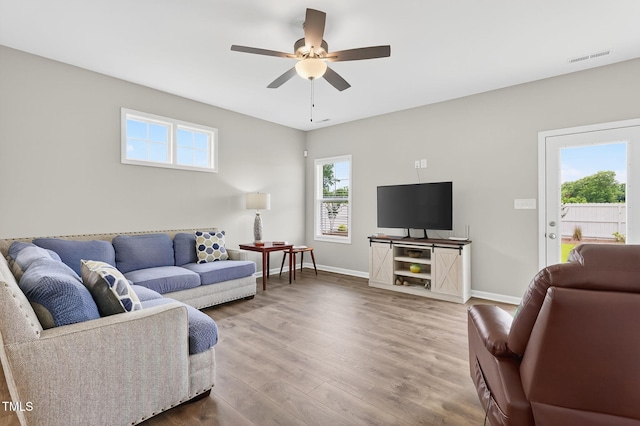 611 Laurel Lake Rd, Salemburg, NC 28385 - living area with wood finished floors and ceiling fan