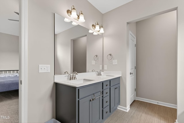 611 Laurel Lake Rd, Salemburg, NC 28385 - ensuite bathroom with double vanity and baseboards