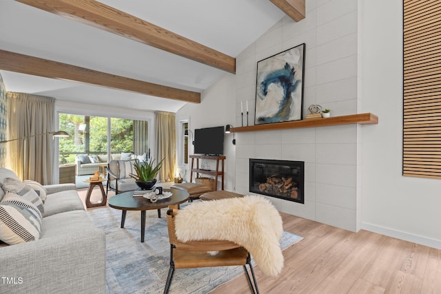 3033 Sylvania Dr, Raleigh, NC 27607 - living area with a fireplace and wood finished floors