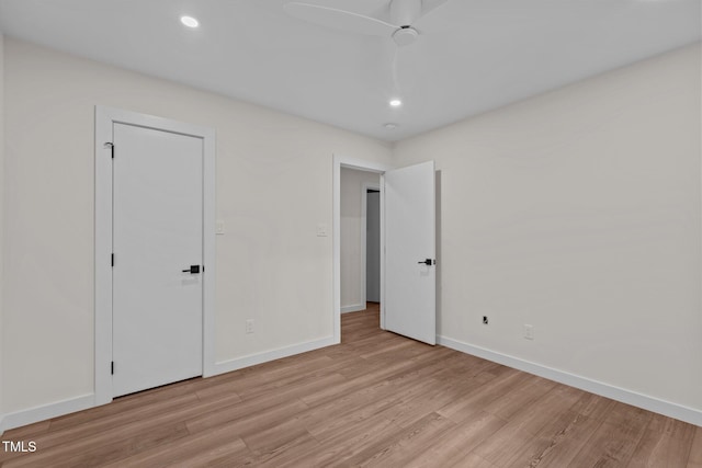 3033 Sylvania Dr, Raleigh, NC 27607 - unfurnished bedroom featuring light wood finished floors, recessed lighting, and a ceiling fan