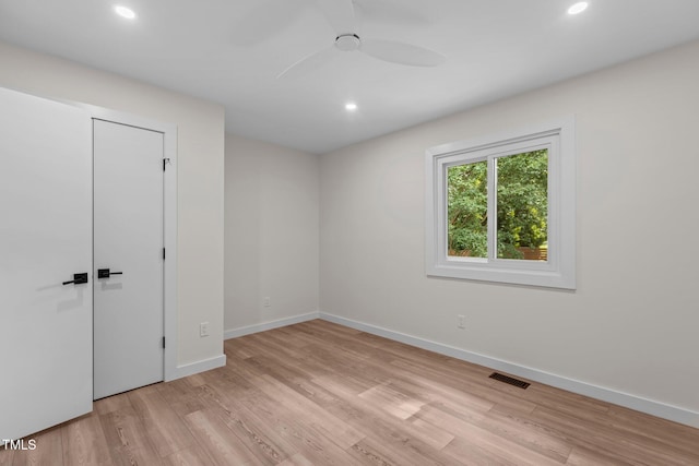 3033 Sylvania Dr, Raleigh, NC 27607 - unfurnished bedroom featuring recessed lighting, light wood-style flooring, and ceiling fan