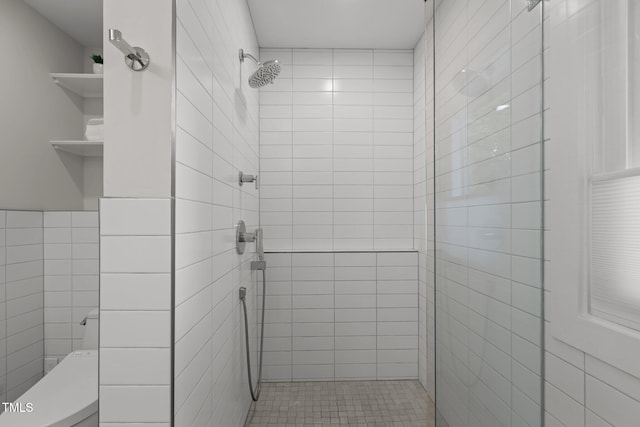 3033 Sylvania Dr, Raleigh, NC 27607 - bathroom with a stall shower and tile walls