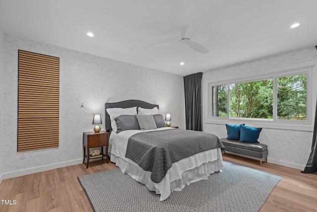 3033 Sylvania Dr, Raleigh, NC 27607 - bedroom featuring light wood-type flooring, wallpapered walls, recessed lighting, and ceiling fan