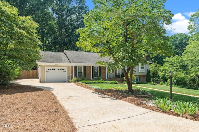 1312 Hampton Valley Rd, Cary, NC 27511 - view of front of property with driveway and an attached garage
