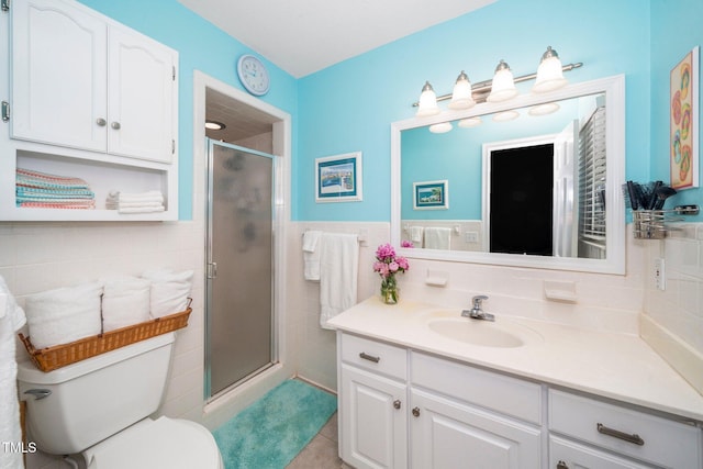 1312 Hampton Valley Rd, Cary, NC 27511 - full bathroom with tile walls, vanity, a shower stall, tile patterned flooring, and a wainscoted wall