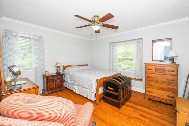 1312 Hampton Valley Rd, Cary, NC 27511 - bedroom with light wood-style floors, crown molding, multiple windows, and ceiling fan