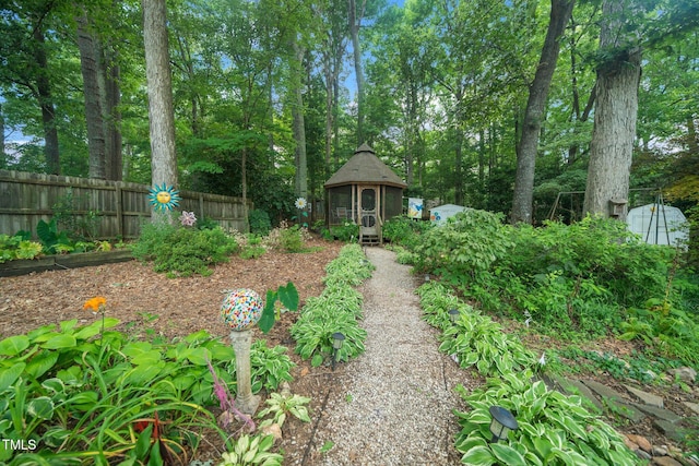 1312 Hampton Valley Rd, Cary, NC 27511 - view of yard with an outbuilding