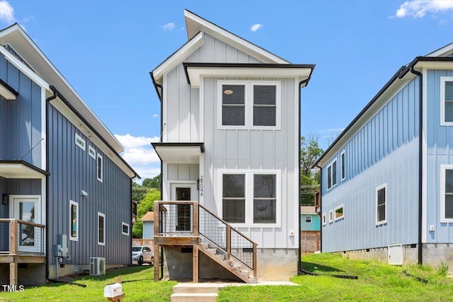 2904 Wadsworth Ave # A, Durham, NC 27707 - back of house featuring board and batten siding and a lawn