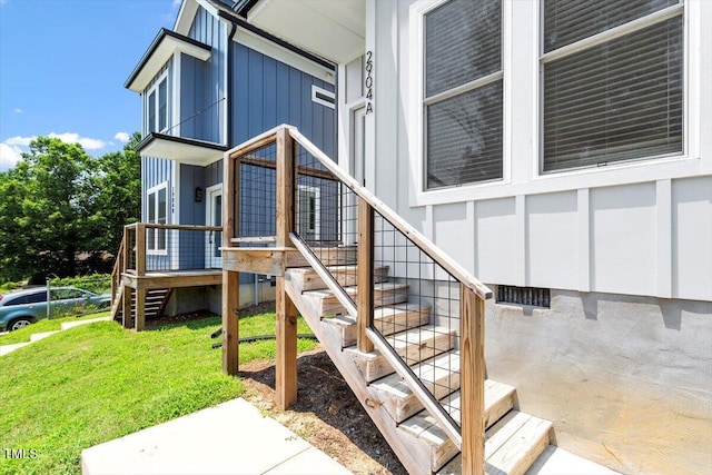 2904 Wadsworth Ave # A, Durham, NC 27707 - doorway to property with a lawn and board and batten siding