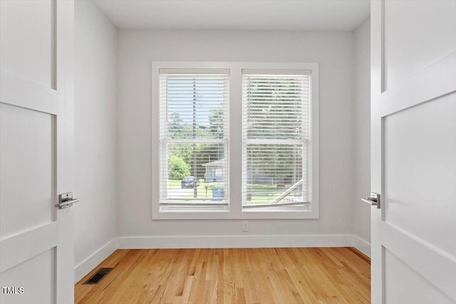 2904 Wadsworth Ave # A, Durham, NC 27707 - spare room with baseboards and light wood-style flooring