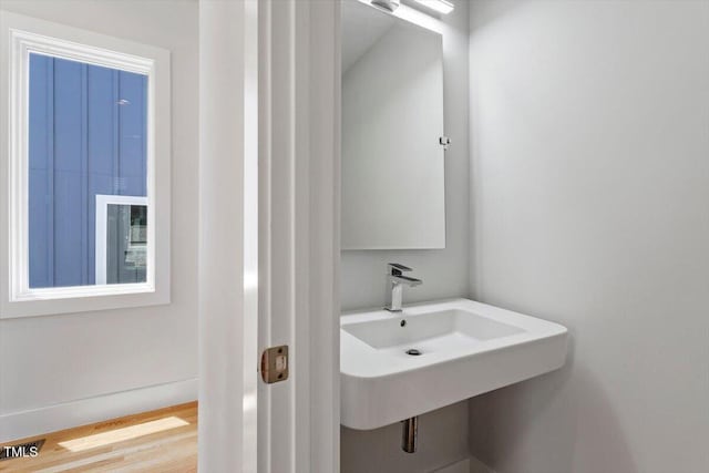 2904 Wadsworth Ave # A, Durham, NC 27707 - bathroom with wood finished floors and a sink