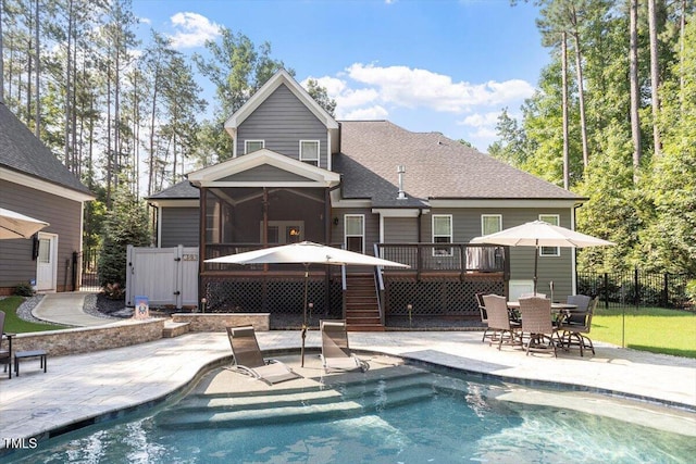 1203 Smith Creek Way, Wake Forest, NC 27587 - rear view of house with a deck, a patio area, stairs, and an outdoor pool