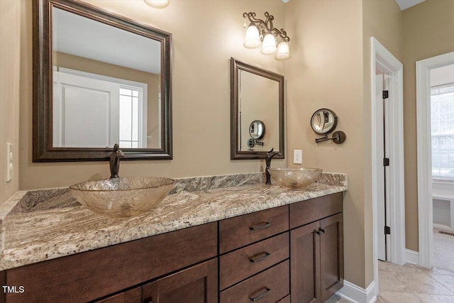 1203 Smith Creek Way, Wake Forest, NC 27587 - full bath with double vanity and baseboards