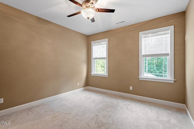 1203 Smith Creek Way, Wake Forest, NC 27587 - spare room with healthy amount of natural light, ceiling fan, and light carpet