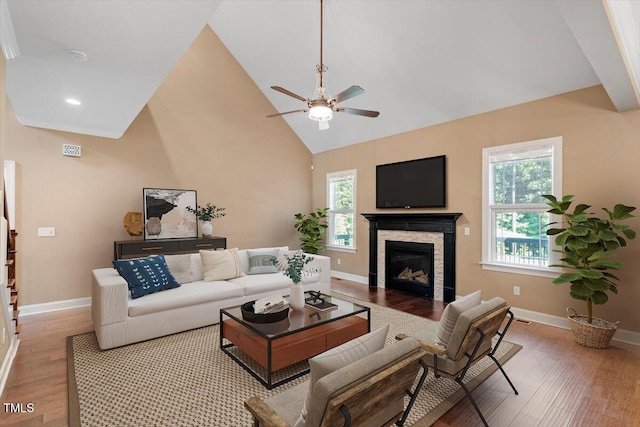 1203 Smith Creek Way, Wake Forest, NC 27587 - living room with ceiling fan, wood finished floors, a stone fireplace, high vaulted ceiling, and recessed lighting