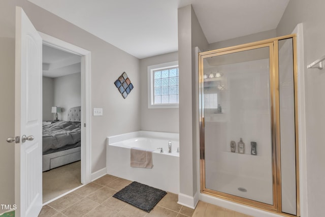 2700 Banks Lake Ct, Fuquay Varina, NC 27526 - ensuite bathroom featuring a garden tub, a stall shower, and tile patterned flooring