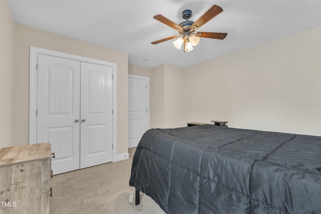2700 Banks Lake Ct, Fuquay Varina, NC 27526 - bedroom with light colored carpet, a closet, and a ceiling fan