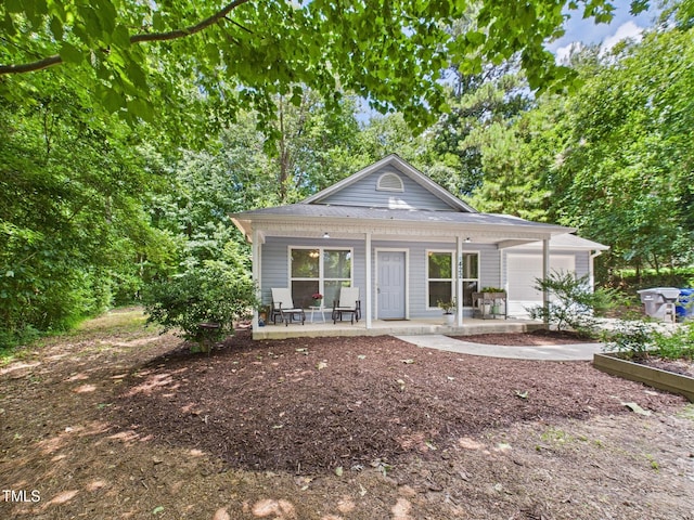 422 Revere Rd, Hillsborough, NC 27278 - view of front of home with covered porch and a garage
