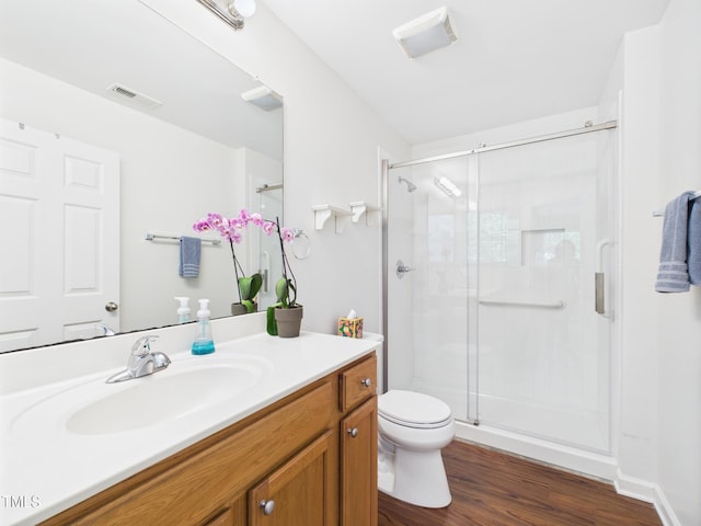 422 Revere Rd, Hillsborough, NC 27278 - bathroom with vanity, a shower stall, and wood finished floors