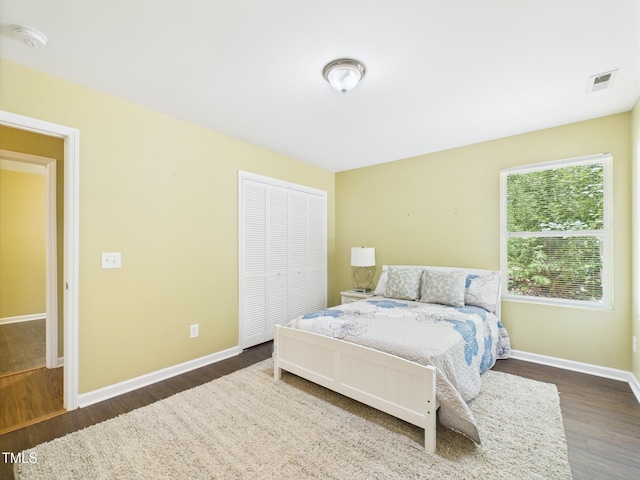 422 Revere Rd, Hillsborough, NC 27278 - bedroom featuring wood finished floors and a closet