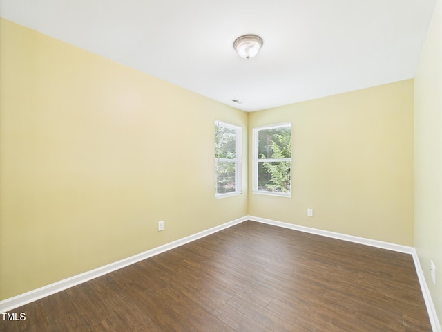 422 Revere Rd, Hillsborough, NC 27278 - unfurnished room with baseboards and dark wood-style flooring