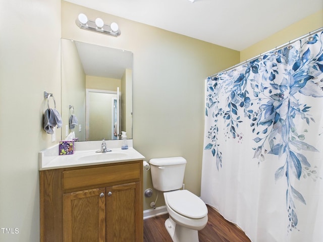 422 Revere Rd, Hillsborough, NC 27278 - full bath with wood finished floors, vanity, and a shower with shower curtain