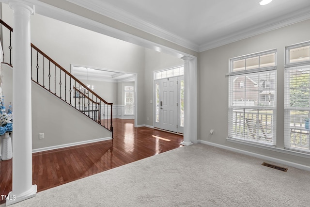 316 Hilliard Forest Dr, Cary, NC 27519 - carpeted entrance foyer with ornate columns, stairway, crown molding, and healthy amount of natural light