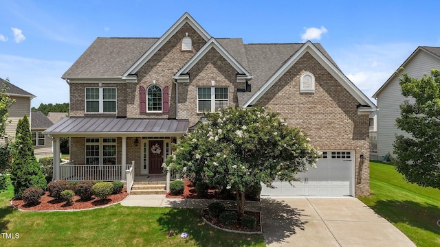 316 Hilliard Forest Dr, Cary, NC 27519 - craftsman-style home with brick siding, covered porch, concrete driveway, and a front lawn