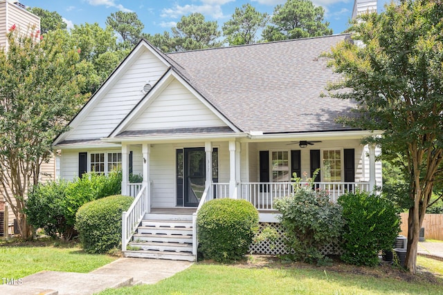 317 Yellow Poplar Ave, Wake Forest, NC 27587 - view of front of home with a porch, roof with shingles, and a ceiling fan