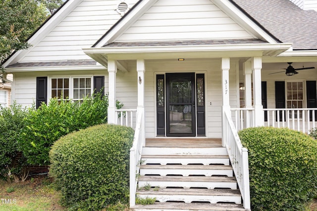 317 Yellow Poplar Ave, Wake Forest, NC 27587 - property entrance with a porch, a shingled roof, and ceiling fan