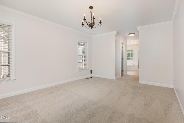 317 Yellow Poplar Ave, Wake Forest, NC 27587 - spare room featuring a chandelier, ornamental molding, and carpet flooring