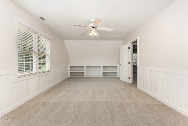 317 Yellow Poplar Ave, Wake Forest, NC 27587 - unfurnished room with attic access, a ceiling fan, a wainscoted wall, carpet flooring, and lofted ceiling