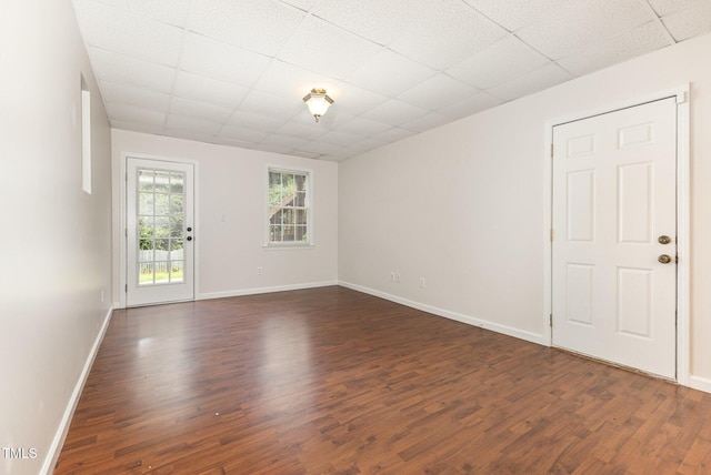 317 Yellow Poplar Ave, Wake Forest, NC 27587 - spare room featuring a paneled ceiling and dark wood finished floors