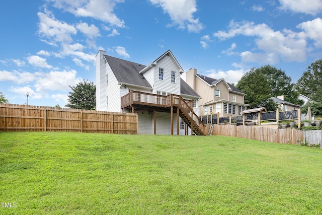 317 Yellow Poplar Ave, Wake Forest, NC 27587 - back of house featuring stairs, a wooden deck, and a fenced backyard