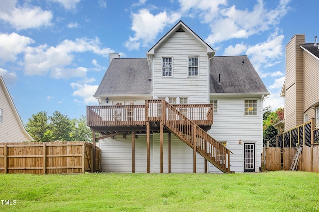 317 Yellow Poplar Ave, Wake Forest, NC 27587 - back of house with a deck, stairs, a fenced backyard, and roof with shingles