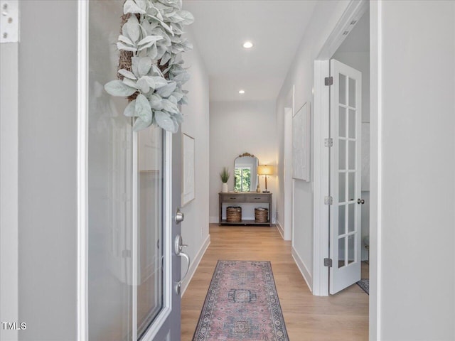 820 Whistable Ave, Wake Forest, NC 27587 - hallway with light wood-style flooring and recessed lighting