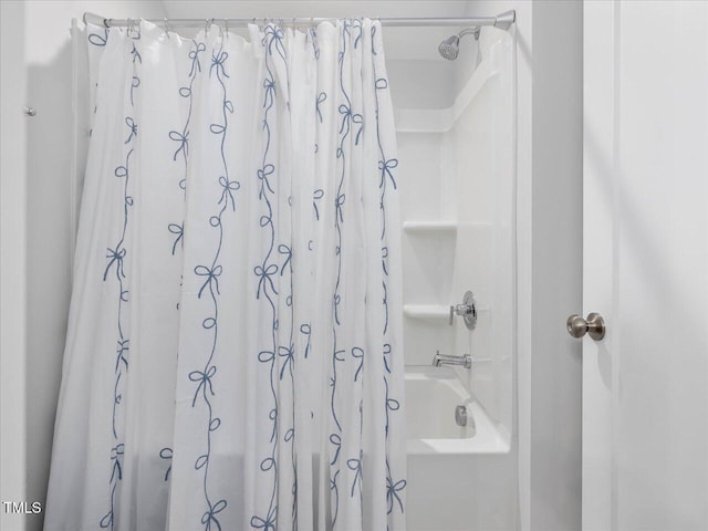 820 Whistable Ave, Wake Forest, NC 27587 - bathroom with shower / bath combo with shower curtain