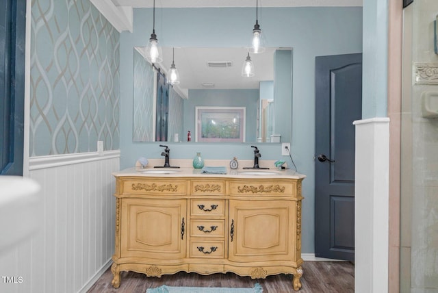 196 Red Wing Dr, Louisburg, NC 27549 - bathroom with double vanity and wood finished floors