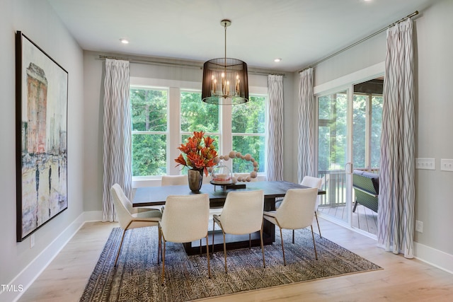 6104 Hope Farm Ln Unit 2, Wake Forest, NC 27587 - dining area featuring wood finished floors and recessed lighting