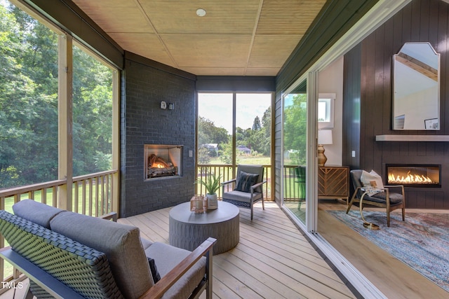 6104 Hope Farm Ln Unit 2, Wake Forest, NC 27587 - sunroom with a fireplace