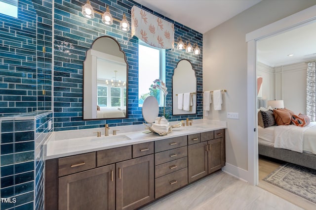 6104 Hope Farm Ln Unit 2, Wake Forest, NC 27587 - ensuite bathroom featuring double vanity and baseboards