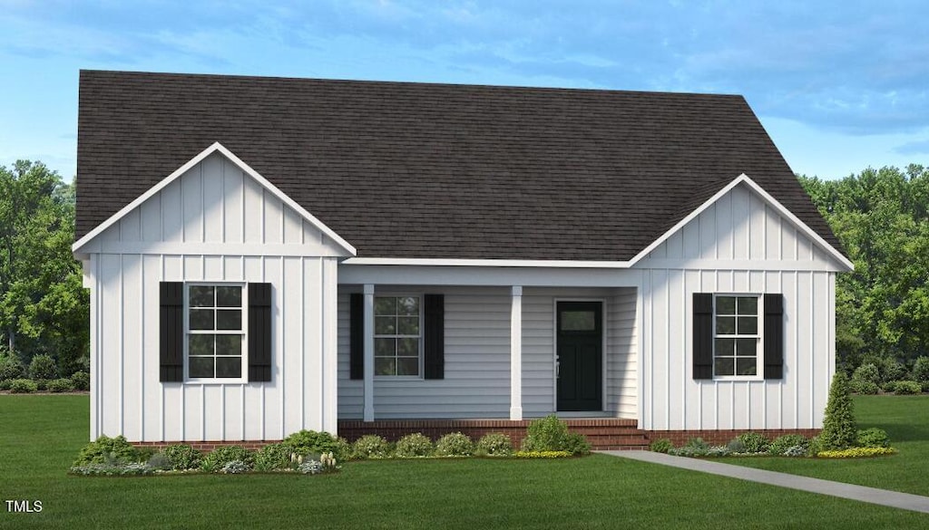 0 New King Rd, Smithfield, NC 27577 - modern farmhouse style home with board and batten siding, a front lawn, and roof with shingles