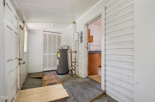 805 N Duke St, Durham, NC 27701 - basement featuring water heater and a sink